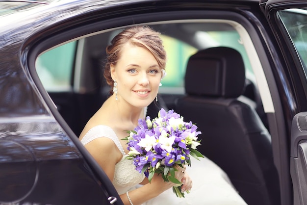 Portrait of the bride at a wedding in a white dress