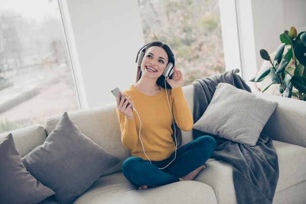 portrait of brunette woman on the couch