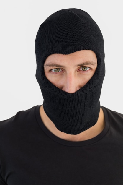 Portrait of burglar wearing a balaclava