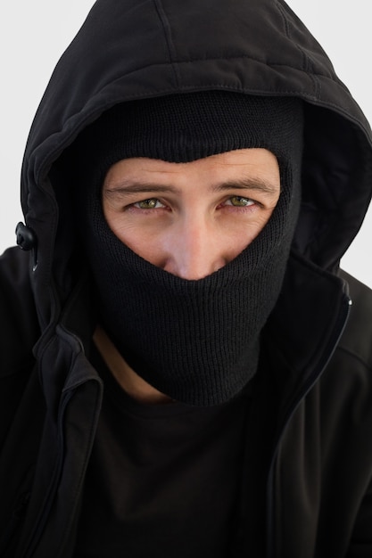 Portrait of burglar wearing a balaclava