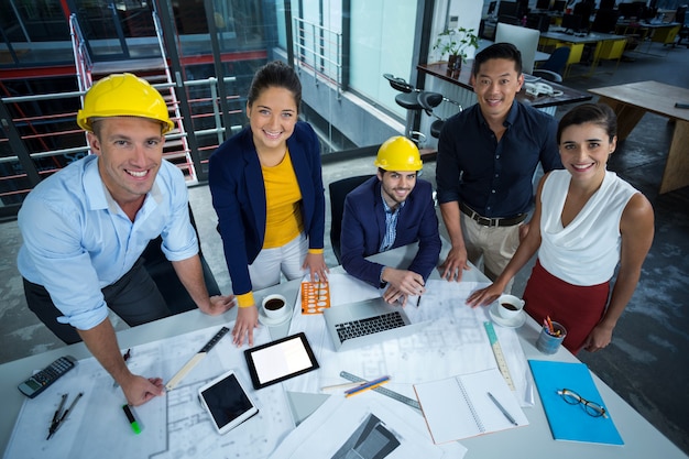 Portrait of business executives discussing during meeting