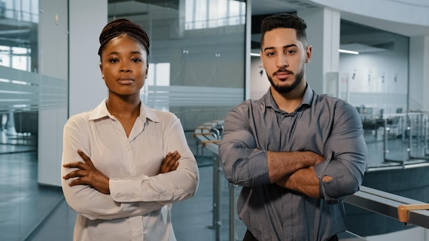 Portrait business people African lady businesswoman and adult Arabian man boss standing in office