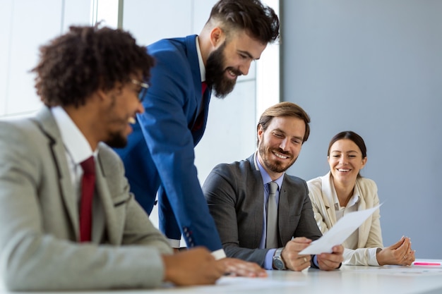 Portrait of business people, architects having discussion in office