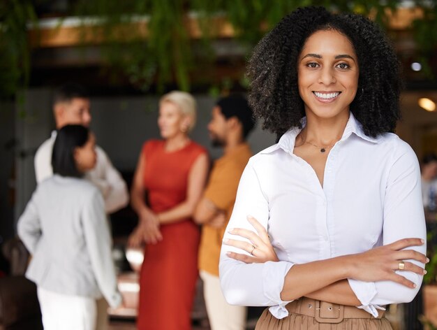 Portrait business and smile of black woman with arms crossed and pride for career or job Boss professional mindset and happy proud and confident female entrepreneur from South Africa in office