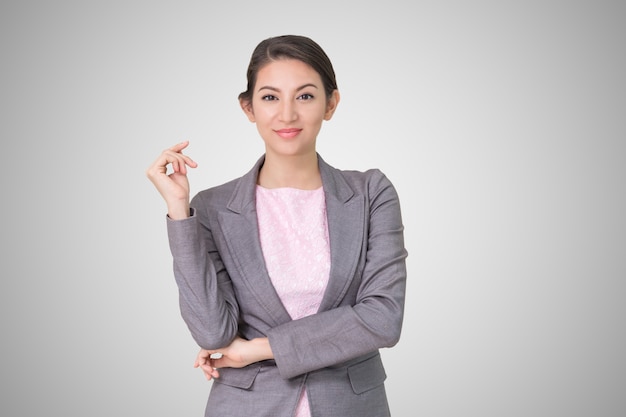 Portrait business woman on a grey background with copy space