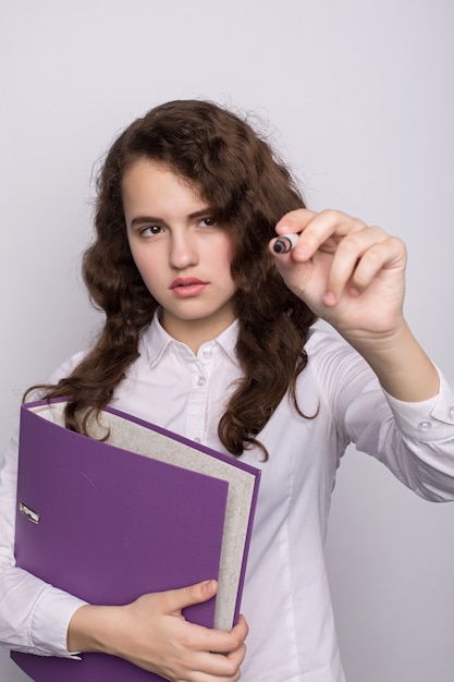 Photo portrait of a business woman holding folder , isolated on white background