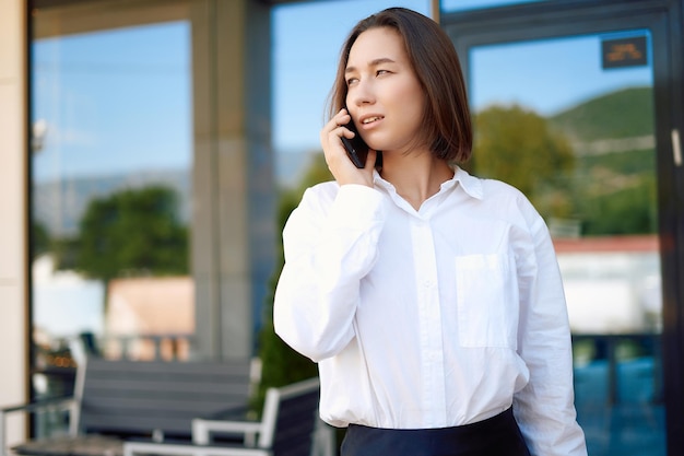 Portrait of a business woman near the office concept of a strong and independent woman