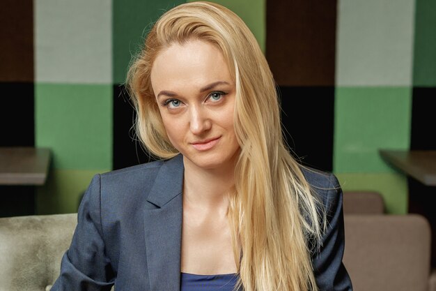 Portrait of business woman in office.