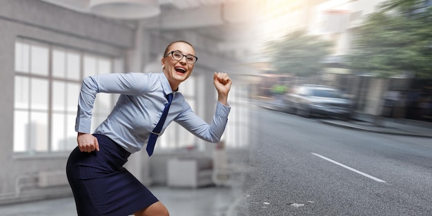 Portrait of business woman running. Mixed media