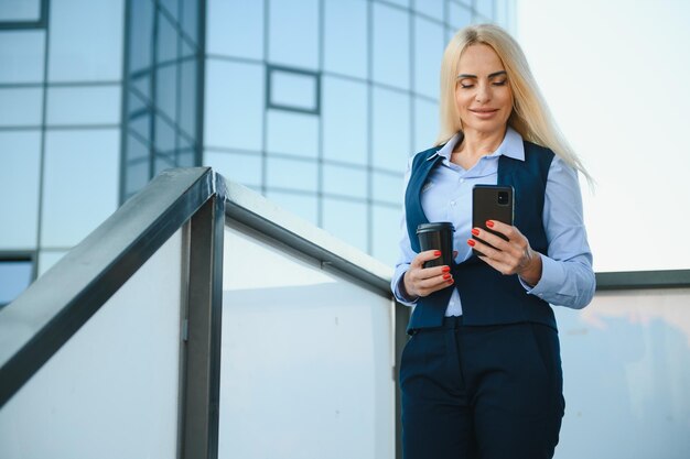 Portrait of business woman smiling outdoor