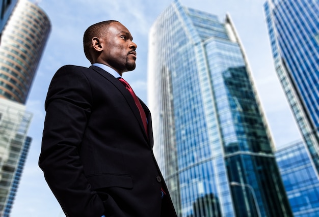 Portrait of a businessman in front of skyscrapers