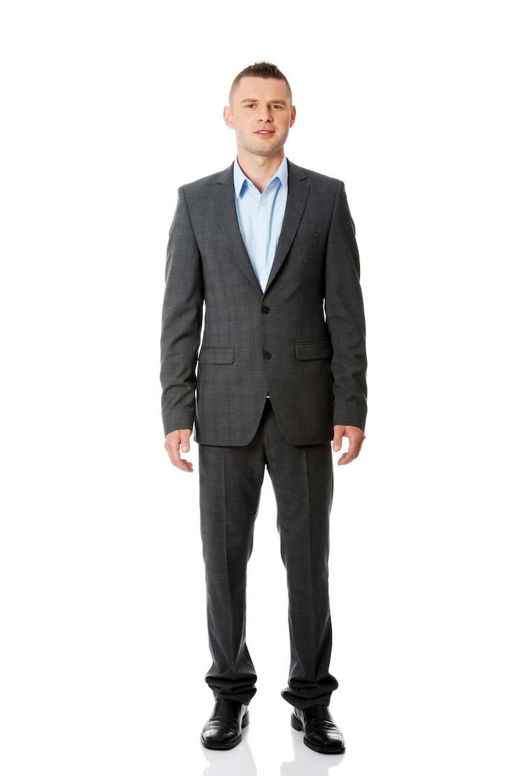 Photo portrait of businessman standing against white background