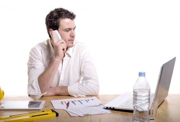 Portrait of businessman talking on mobile phone