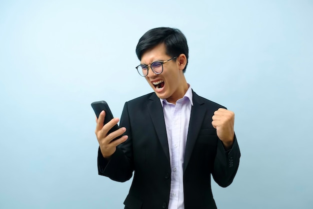 Portrait of businessman talking on phone