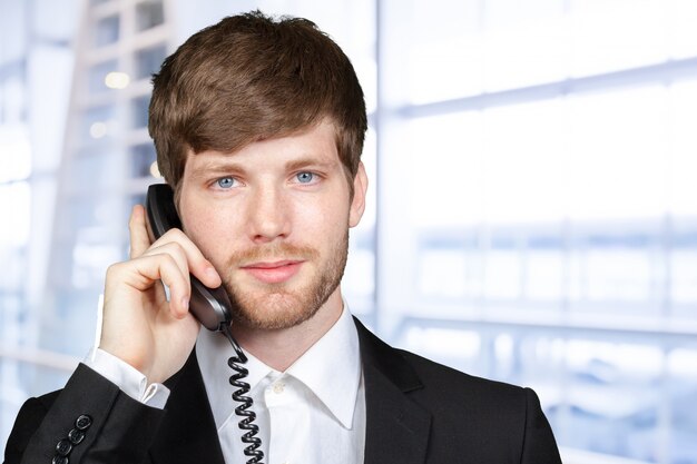 Portrait of a businessman talking on the phone