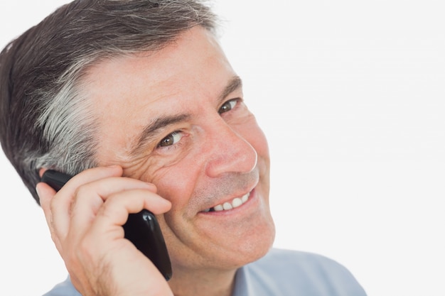 Portrait of businessman using cell phone