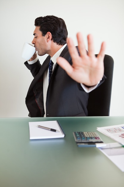 Portrait of a businessman not willing to be disturbed