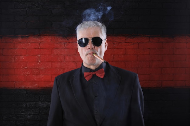 portrait of a businessman with a cigar