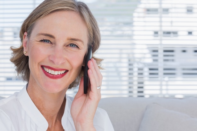 Portrait of businesswoman calling 