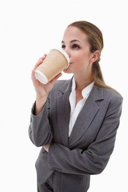 Portrait of a businesswoman drinking a takeaway coffee