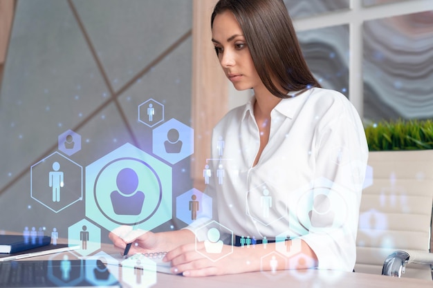 Portrait of businesswoman in formal wear working with documents and looking for employees to hire new candidates for international business consulting HR networking icons over office background