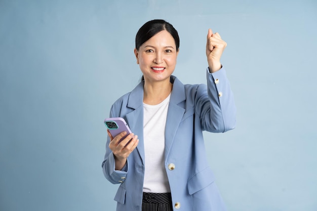 Portrait of a businesswoman using a smartphone