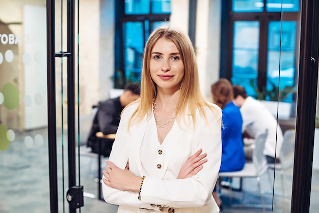 Portrait of businesswoman with crossed arms