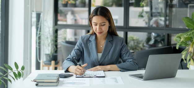 Portrait of businesswoman working at office
