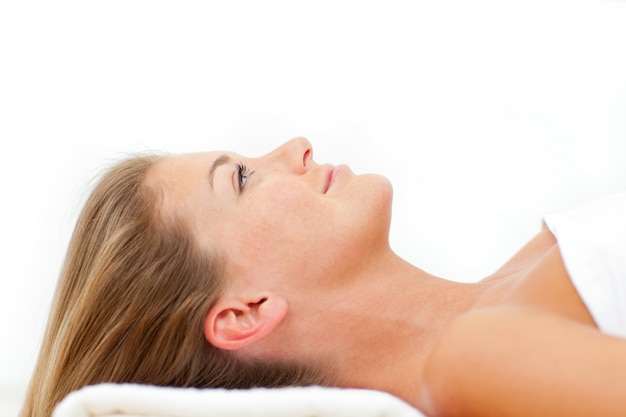 Portrait of calm woman relaxing after a spa treatment