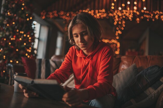 Photo portrait of candid authentic dreamer boy teenager in sadness depressing emotion at home xmas