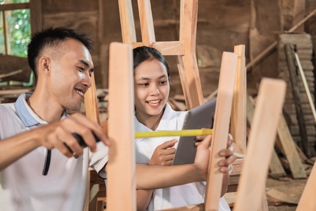 Portrait of a carpenter in his workspace