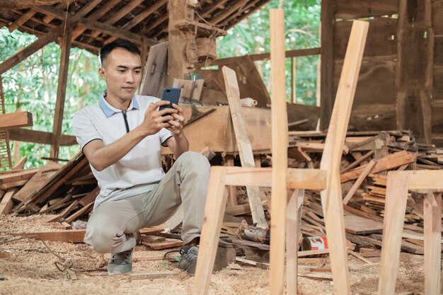 Portrait of a carpenter in his workspace