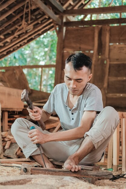 Portrait of a carpenter in his workspace