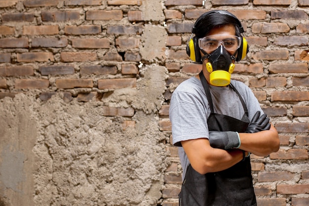 Portrait of carpenter man wearing safety mask