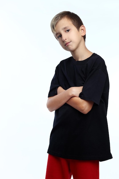Portrait of casual boy on white background