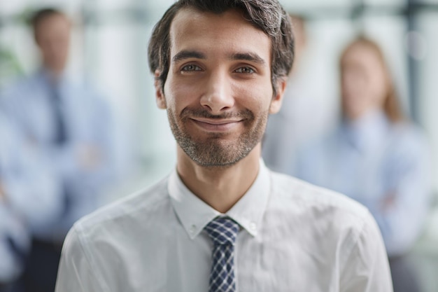 Portrait of casual Caucasian male worker looking at camera