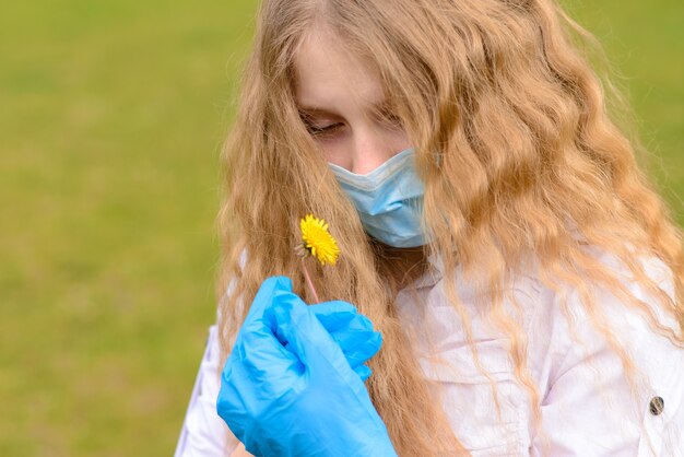 Portrait of Caucasian child in face mask and gloves