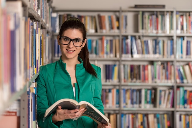 Portrait Of An Caucasian College Student Woman In Library  Shallow Depth Of Field