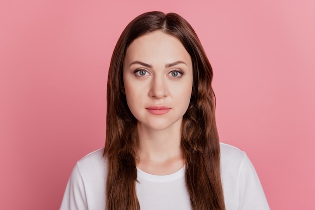 Portrait of charming lovely dream girl look camera on pink background