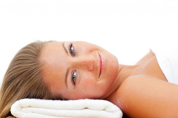 Portrait of charming woman relaxing after a spa treatment