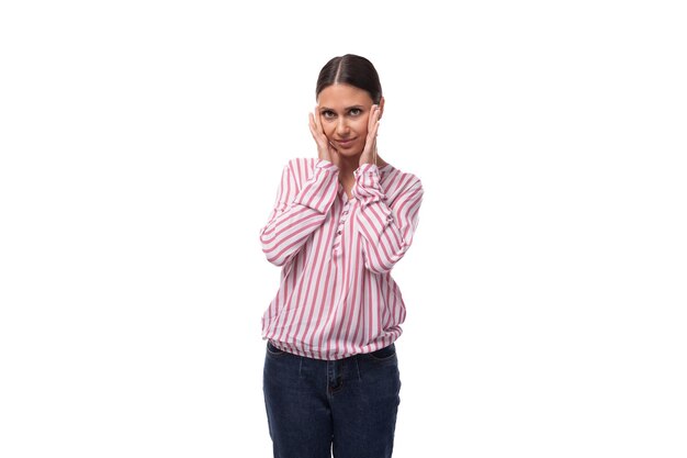 Photo portrait of a charming young brunette office worker woman dressed in a shirt with stripes