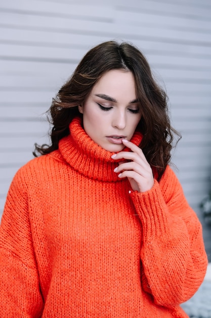 Portrait of charming young woman