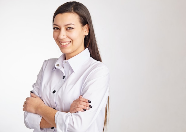 Portrait of a cheerful businesswoman and looking at camera