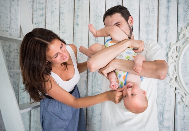 Portrait of cheerful caucasian young family