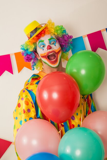 Portrait of a cheerful clown at a party