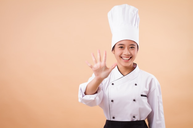 Portrait of cheerful female chef