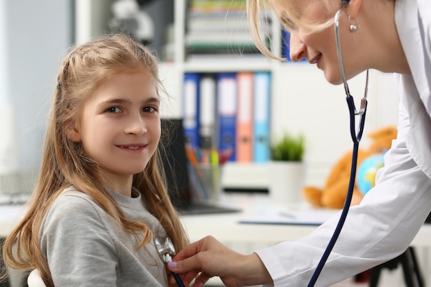 portrait of cheerful little child at pediatrician appointment