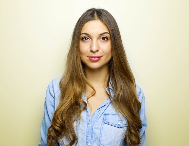 Portrait of cheerful pretty brunette young woman