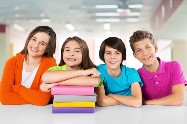 Portrait of cheerful school children flashing toothy