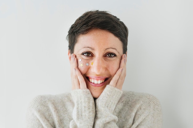 Portrait of a cheerful shorted-hair woman